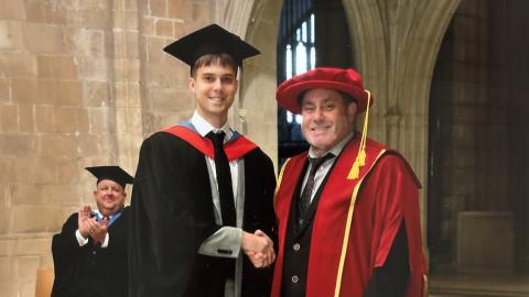 Graduation photo of a Zenitel Engineering Apprentice
